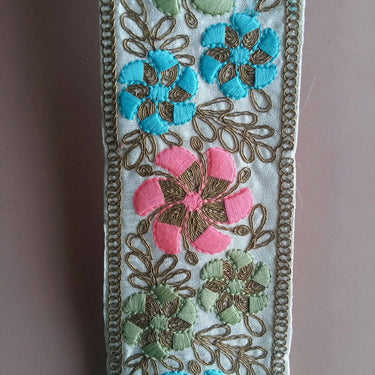 Off White Fabric Trim With Bronze, Green, Pink And Blue/Yellow Floral Embroidery